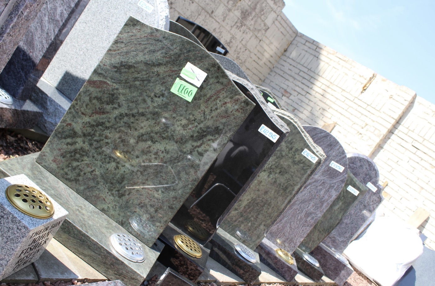 Granite headstones in different colours on display at the Bishopbriggs yard